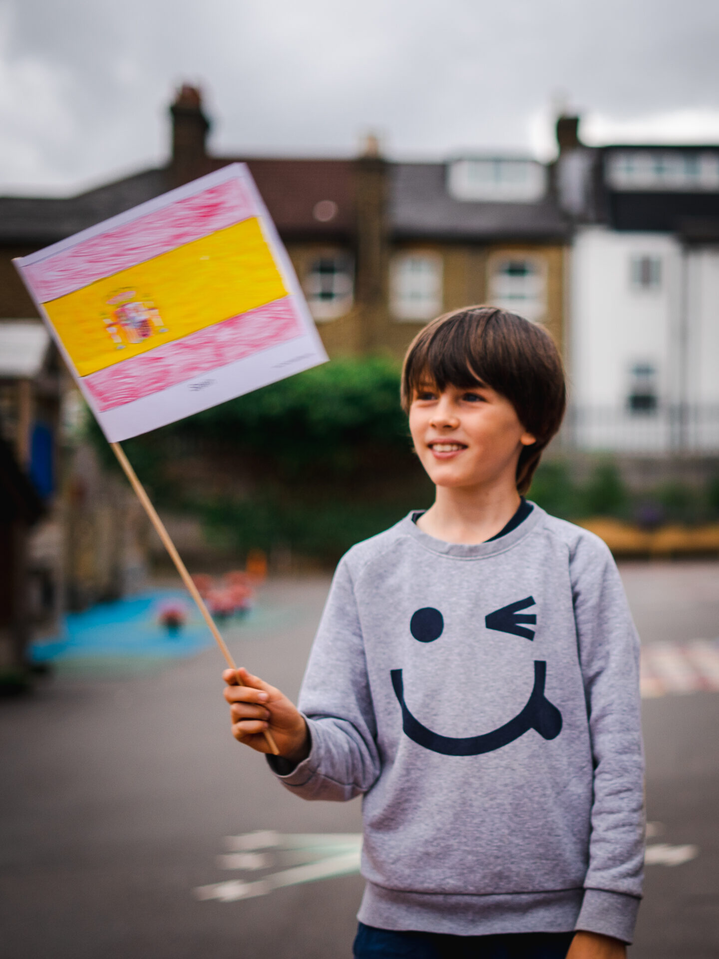 kid waving Spanish flag